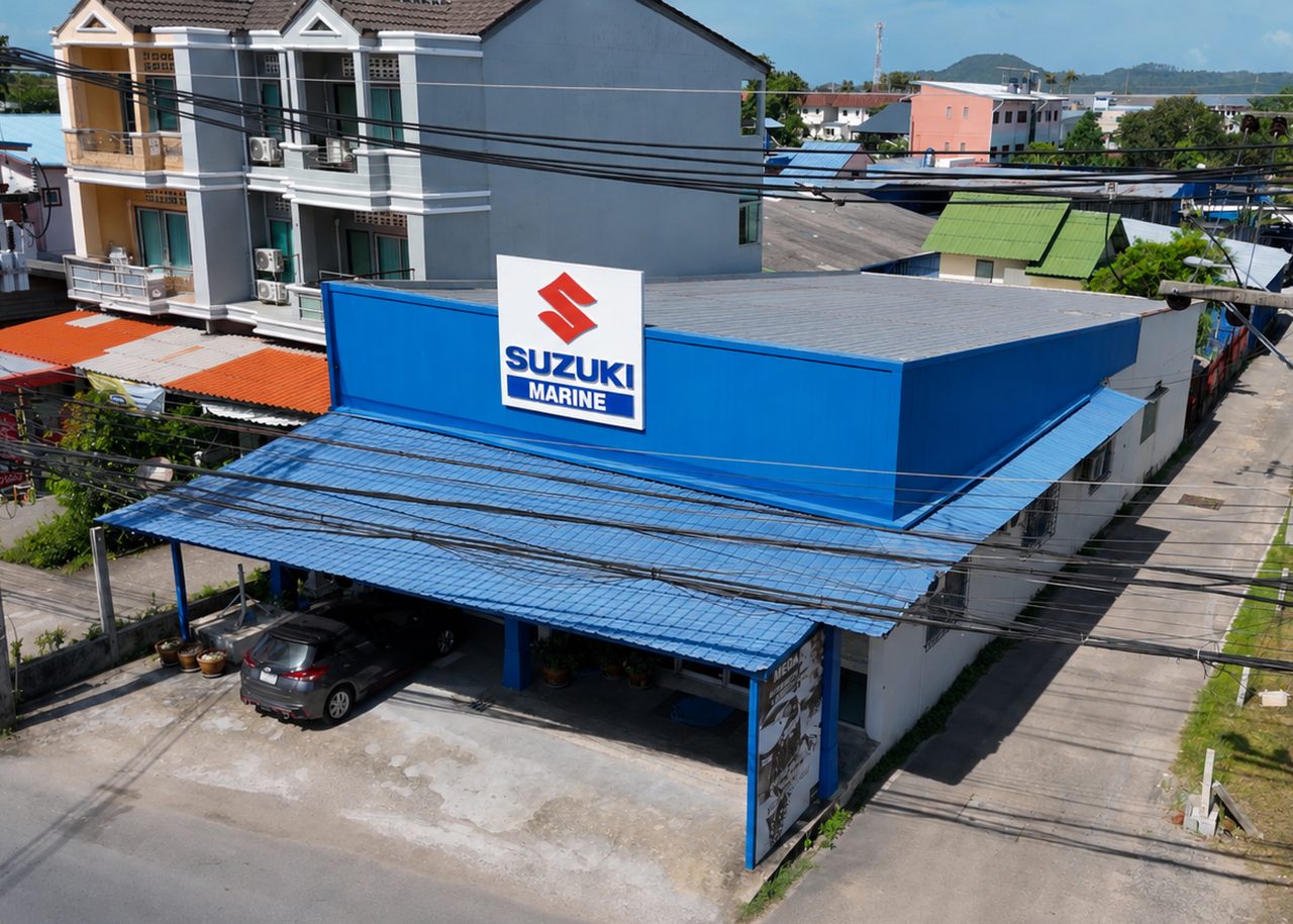 The blue Suzuki Marine dealership building in Phuket, seen from above